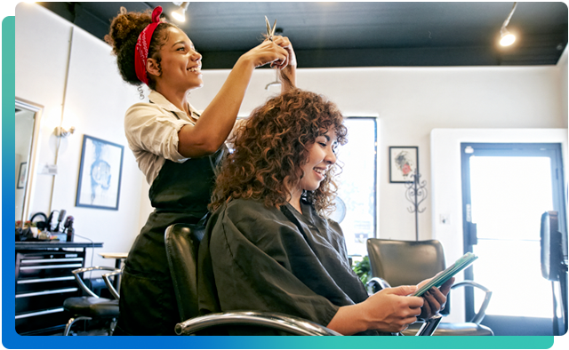 Person sitting in a hair salon