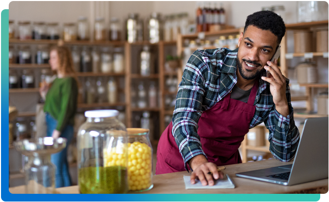 Man on phone at a business