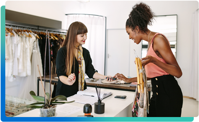 Tailor speaking with client