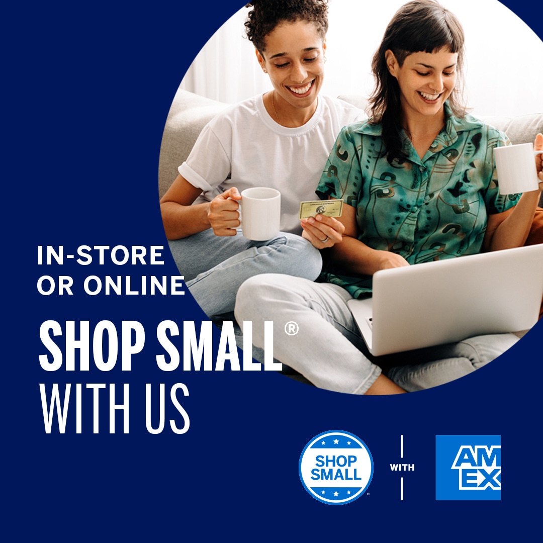 Graphic with an image of two women sitting on the couch looking at laptop and reading Amex credit card number for online purchase. Message overlaid says In-store or online; shop small with us and includes the Shop small with Amex logo