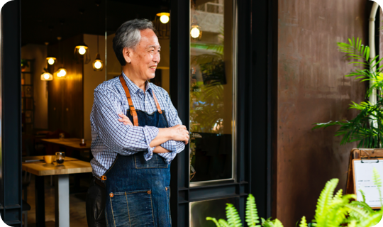Restaurant owner ready to greet customers