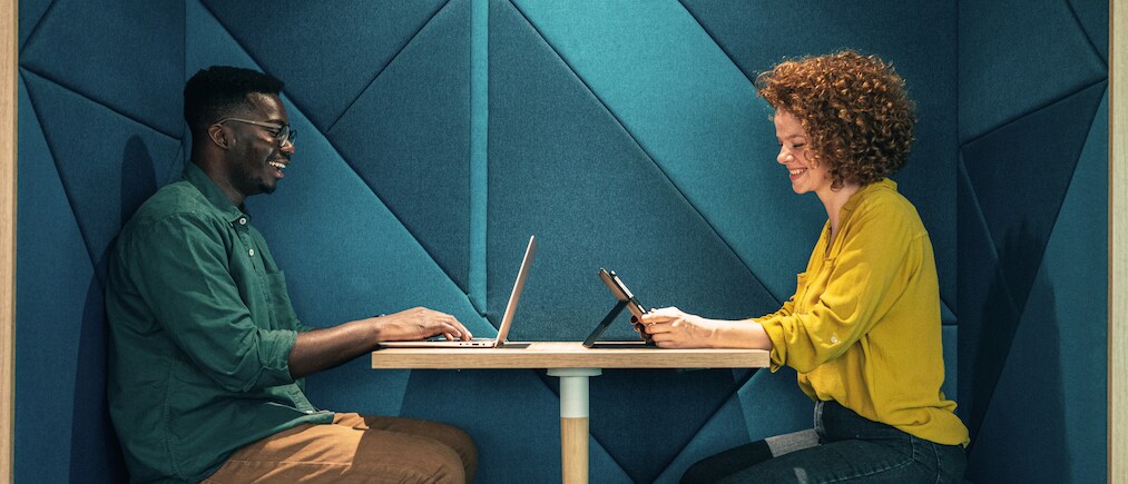 coworkers working in a coworking space
