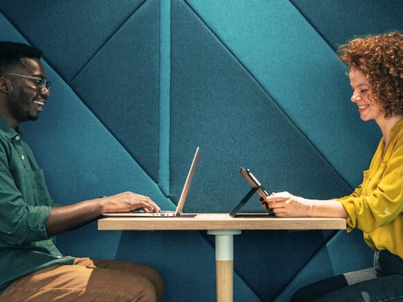 coworkers working in a coworking space