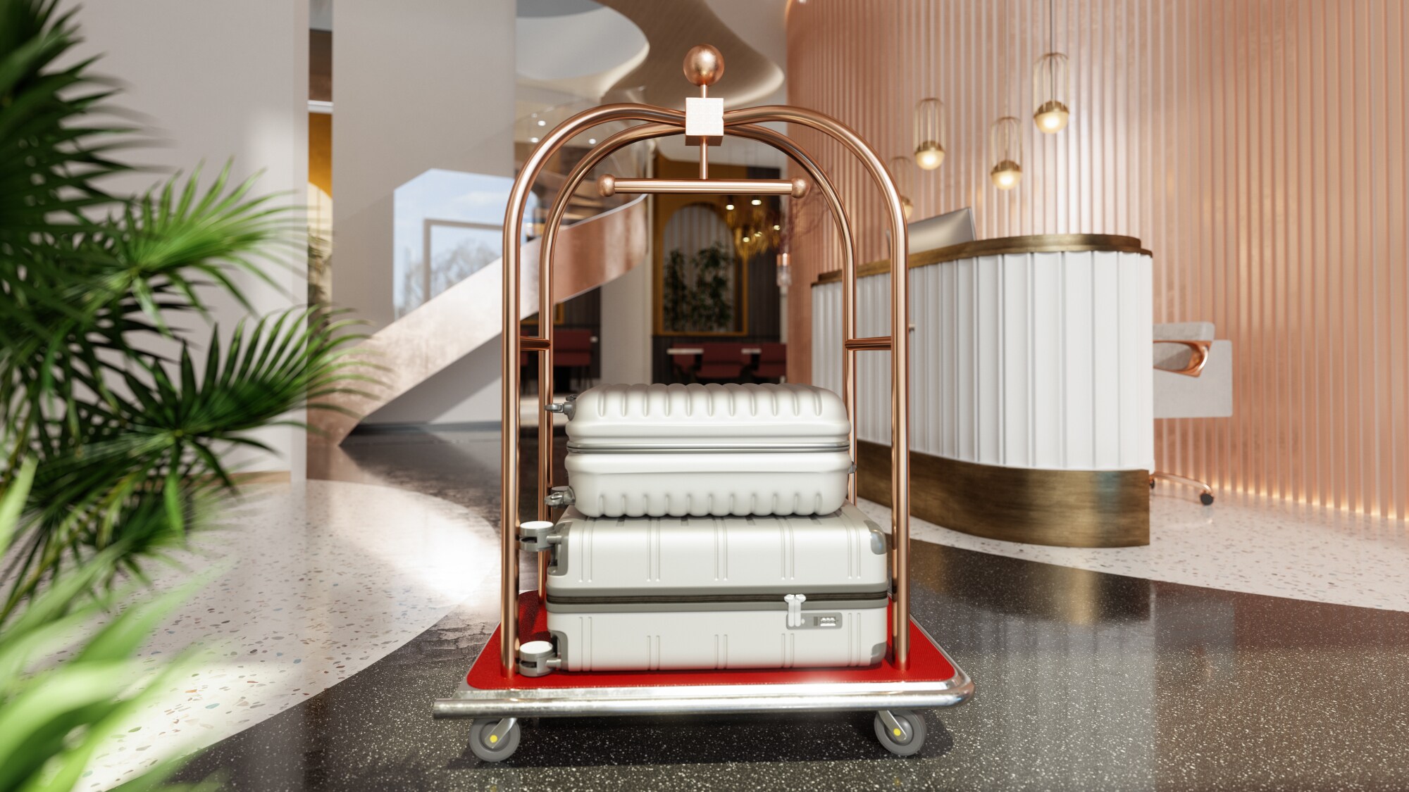 Ein Trolley in einer Hotellobby, auf dem zwei silberne Hartschalenkoffer liegen. Ein Trolley in einer Hotellobby, auf dem zwei silberne Hartschalenkoffer liegen.