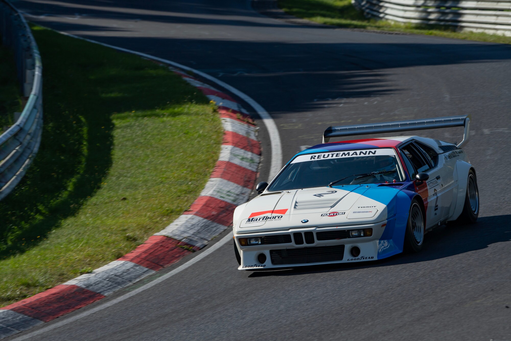 Ein fahrender BMW M1 Procar auf einem Parcours. Ein fahrender BMW M1 Procar auf einem Parcours.