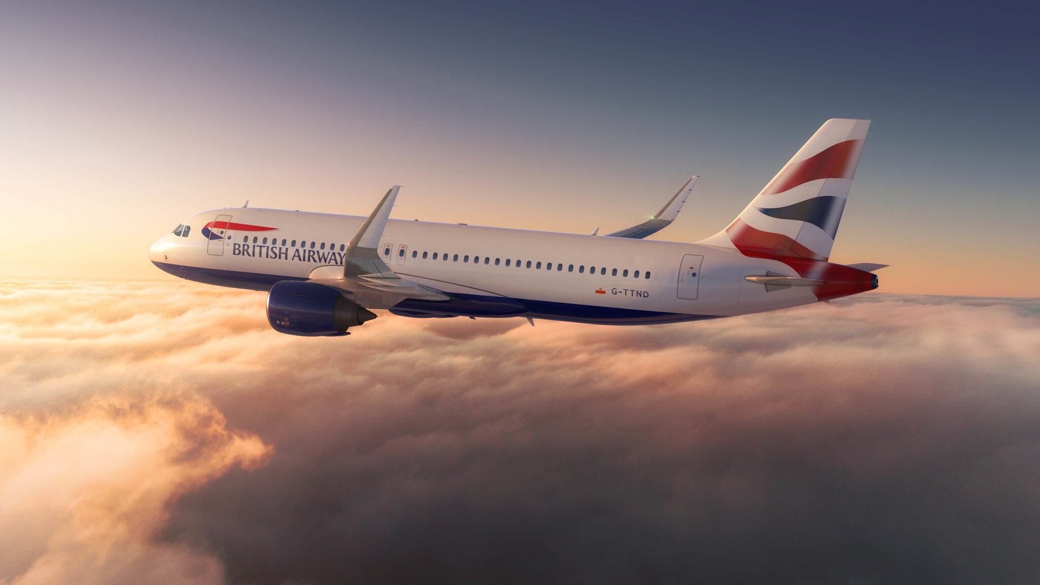 Ein Passagierflugzeug von British Airways fliegt über den Wolken.