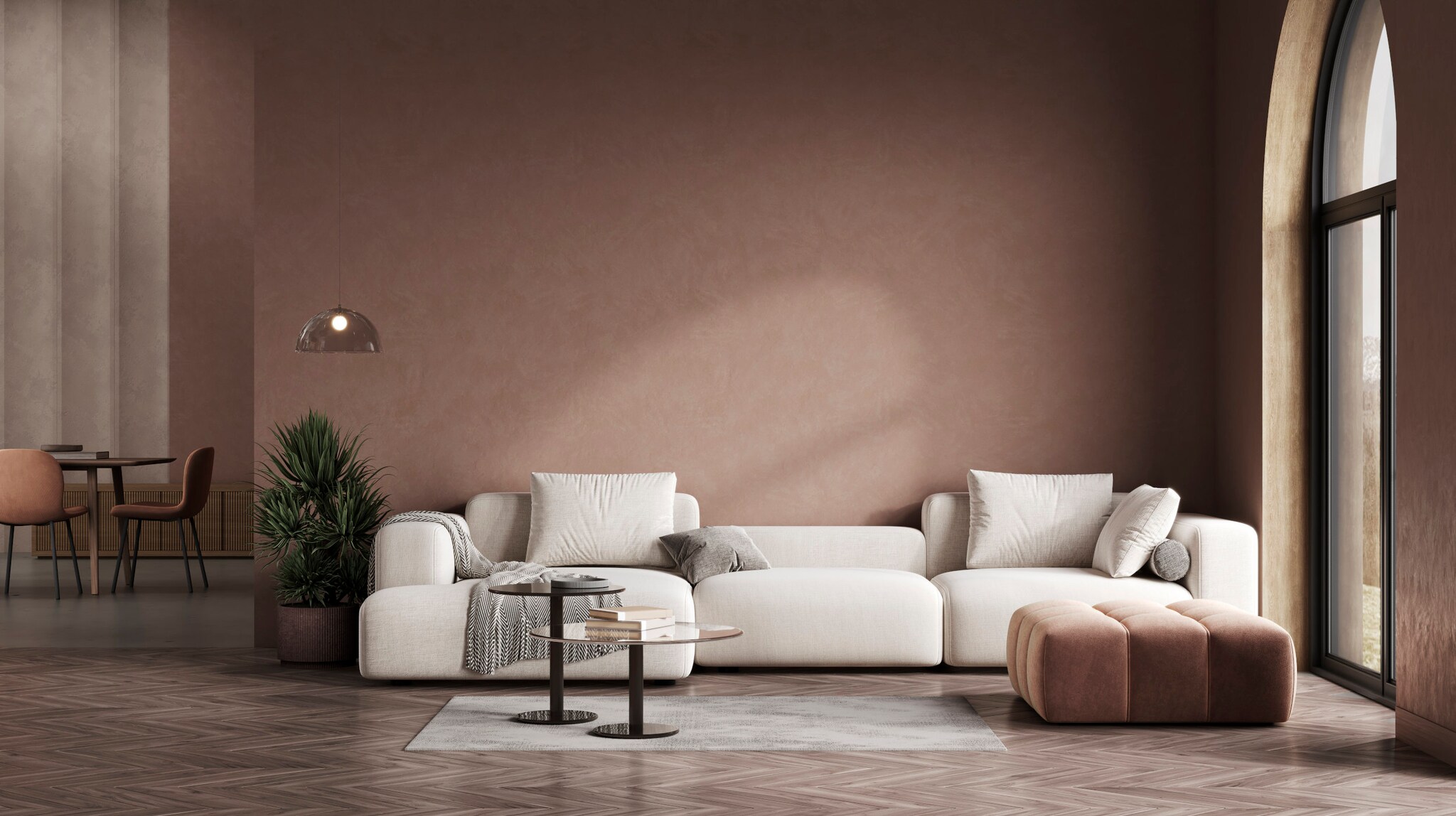 Luxuriöses und cleanes Wohnzimmer mit modernen Loungemöbeln in warmen erdigen Tönen. 