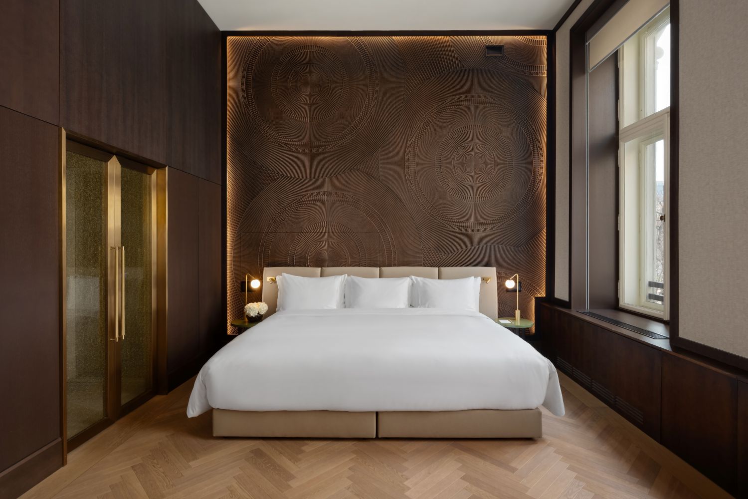 Ein Bett in einem Zimmer des Alamanc Palais Vienna