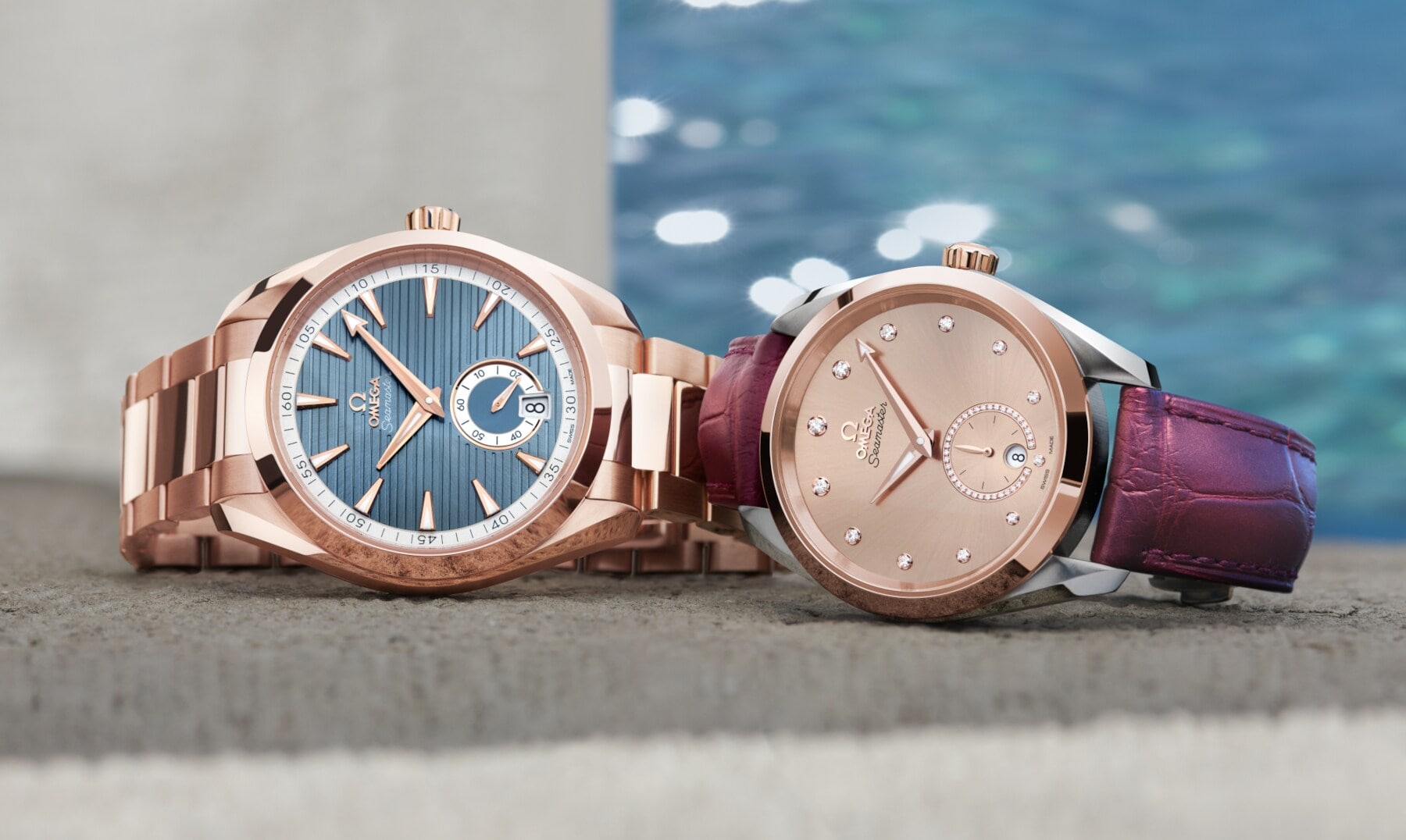 Zwei Uhren liegen nebeneinander auf der Seite auf einer Mauer Zwei Uhren liegen nebeneinander auf der Seite auf einer Mauer