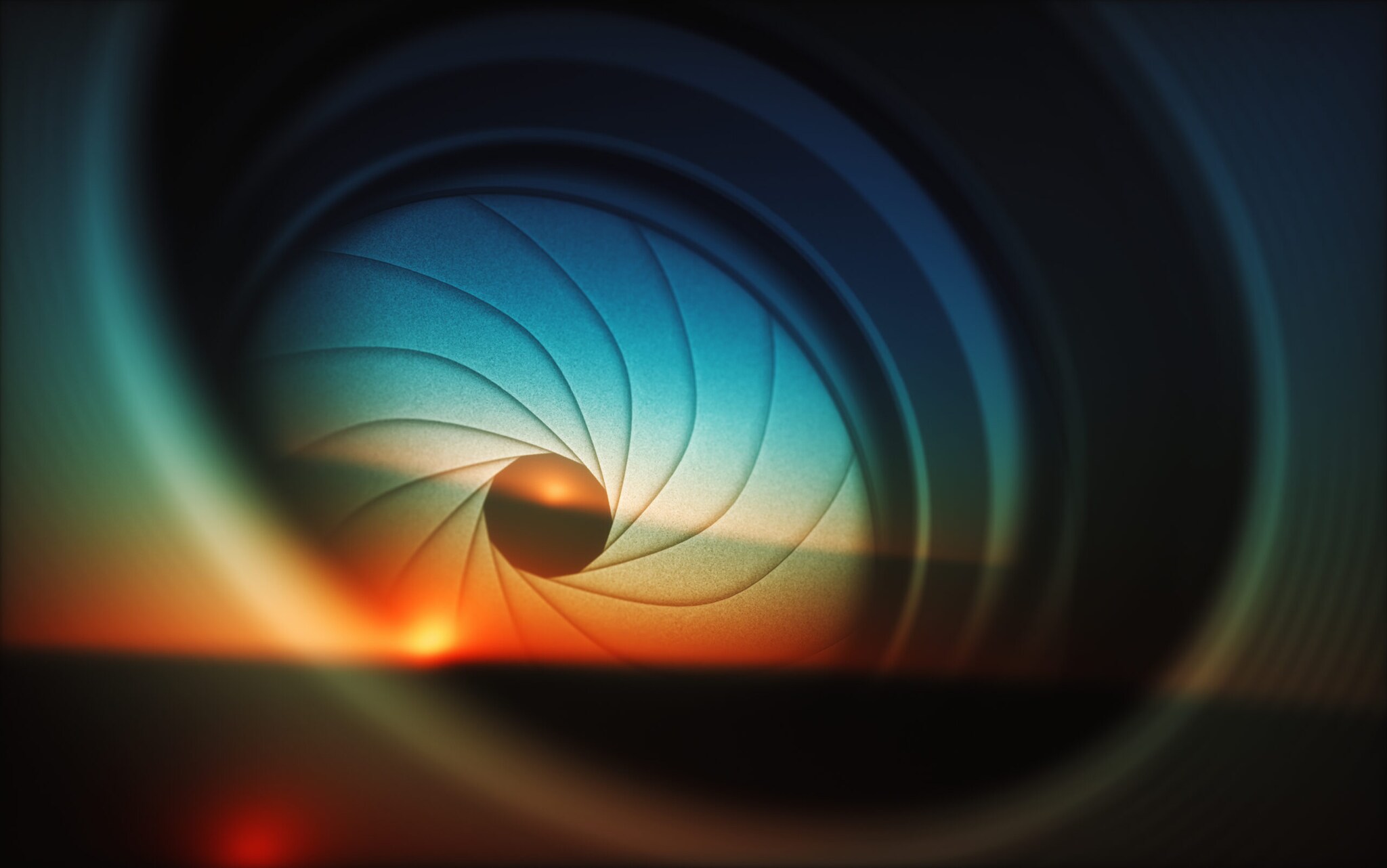 Die Blende eines Objektivs reflektiert einen Sonnenuntergang Die Blende eines Objektivs reflektiert einen Sonnenuntergang