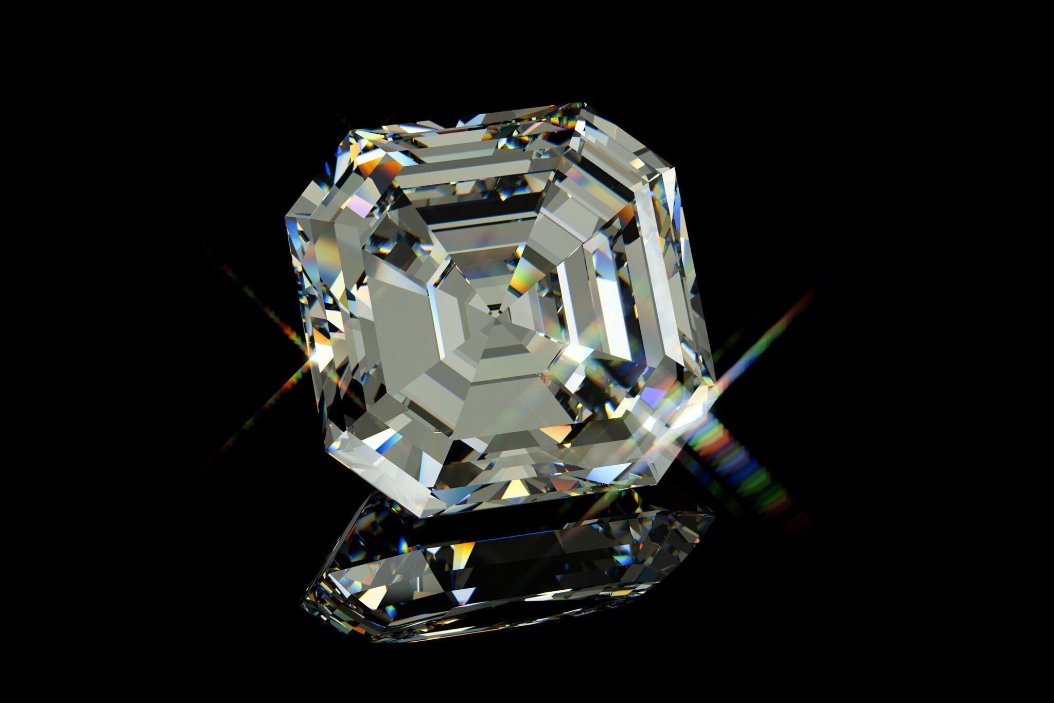 Ein quadratischer Diamant im Asscher-Schliff auf schwarzglänzenden Hintergrund. Ein quadratischer Diamant im Asscher-Schliff auf schwarzglänzenden Hintergrund.