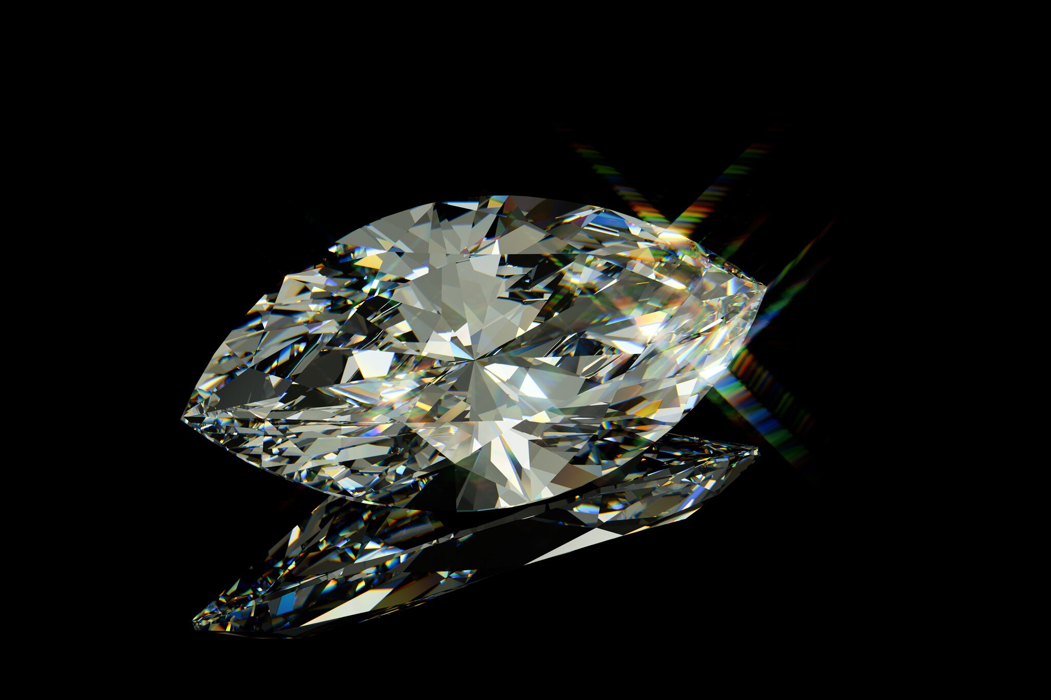 Ein Diamant mit Marquiseschliff vor schwarzem Hochglanz-Hintergrund. Ein Diamant mit Marquiseschliff vor schwarzem Hochglanz-Hintergrund.