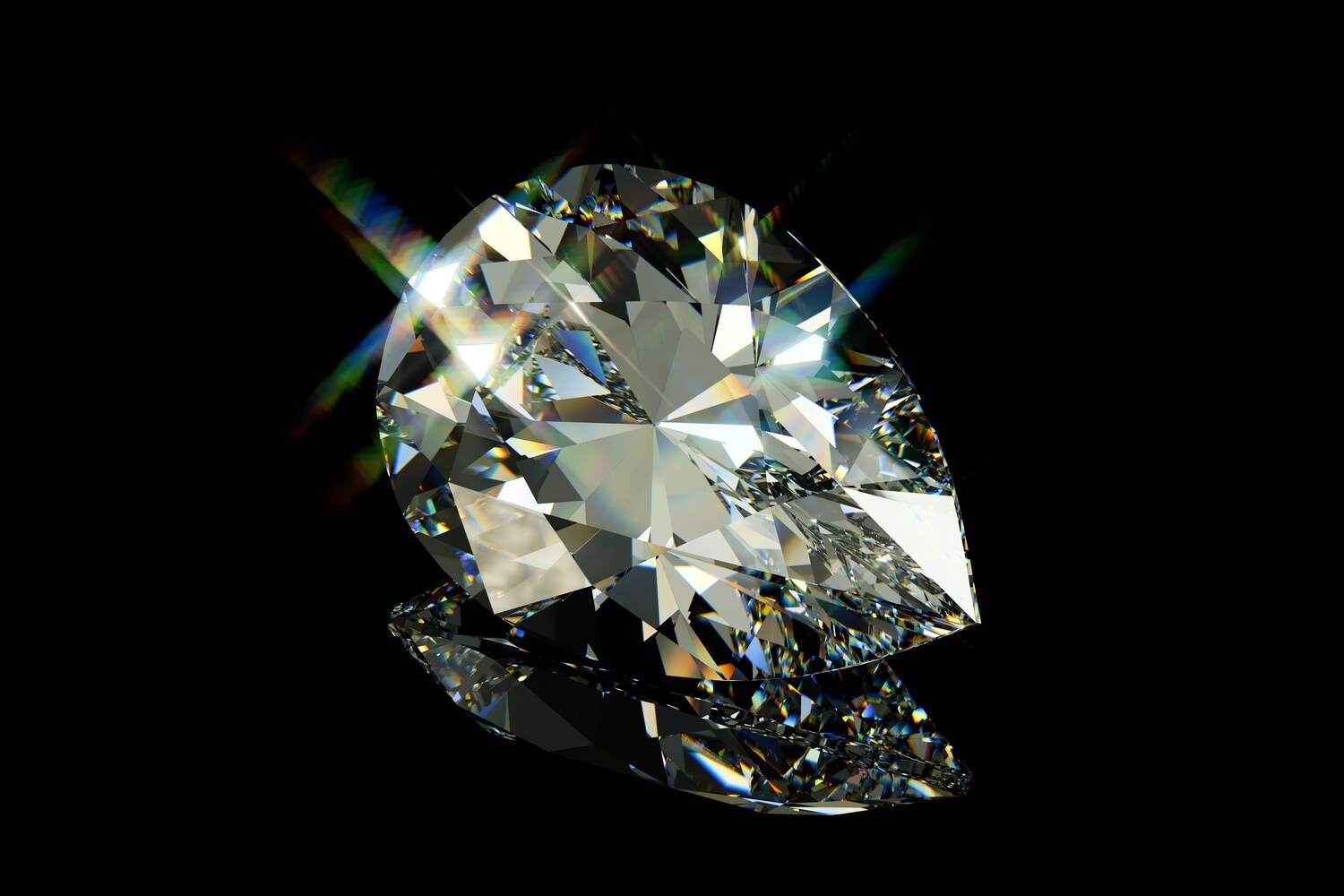 Ein Diamant im Tropfenschliff auf schwarzem Hochglanz-Hintergrund. Ein Diamant im Tropfenschliff auf schwarzem Hochglanz-Hintergrund.