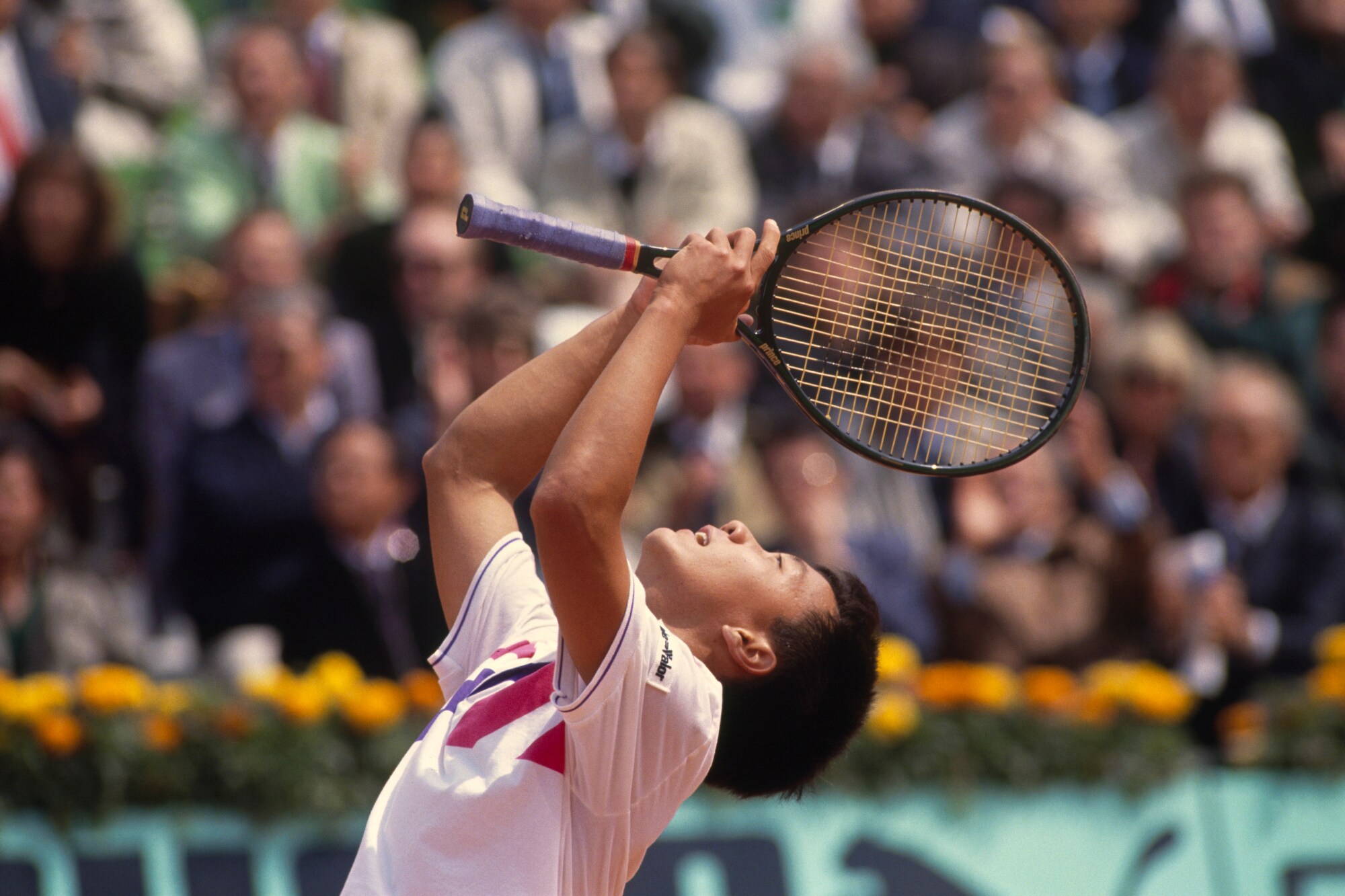 Der Tennisspieler Michael Chang jubelt über seinen Sieg Der Tennisspieler Michael Chang jubelt über seinen Sieg