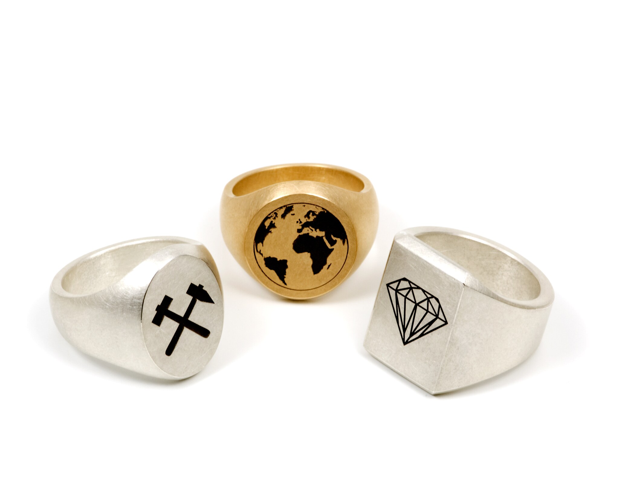 Drei Ringe mit außergewöhnlichen Motiven