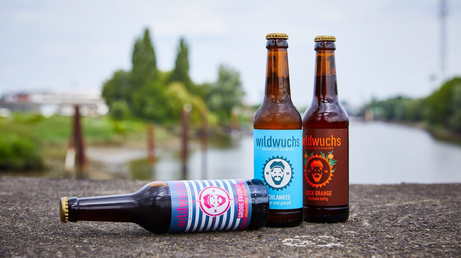 Drei Bierflaschen der Marke Wildwuchs Drei Bierflaschen der Marke Wildwuchs