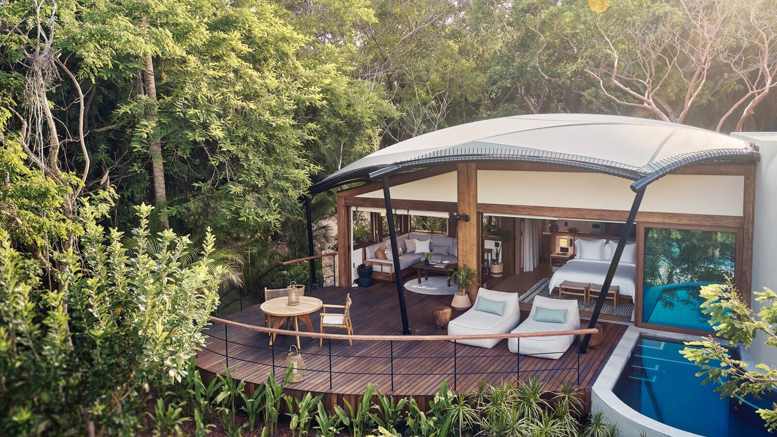 Glamping-Unterkunft im Wald mit Pool, möblierter Terrasse, Wohnzimmer und Schlafzimmer Glamping-Unterkunft im Wald mit Pool, möblierter Terrasse, Wohnzimmer und Schlafzimmer