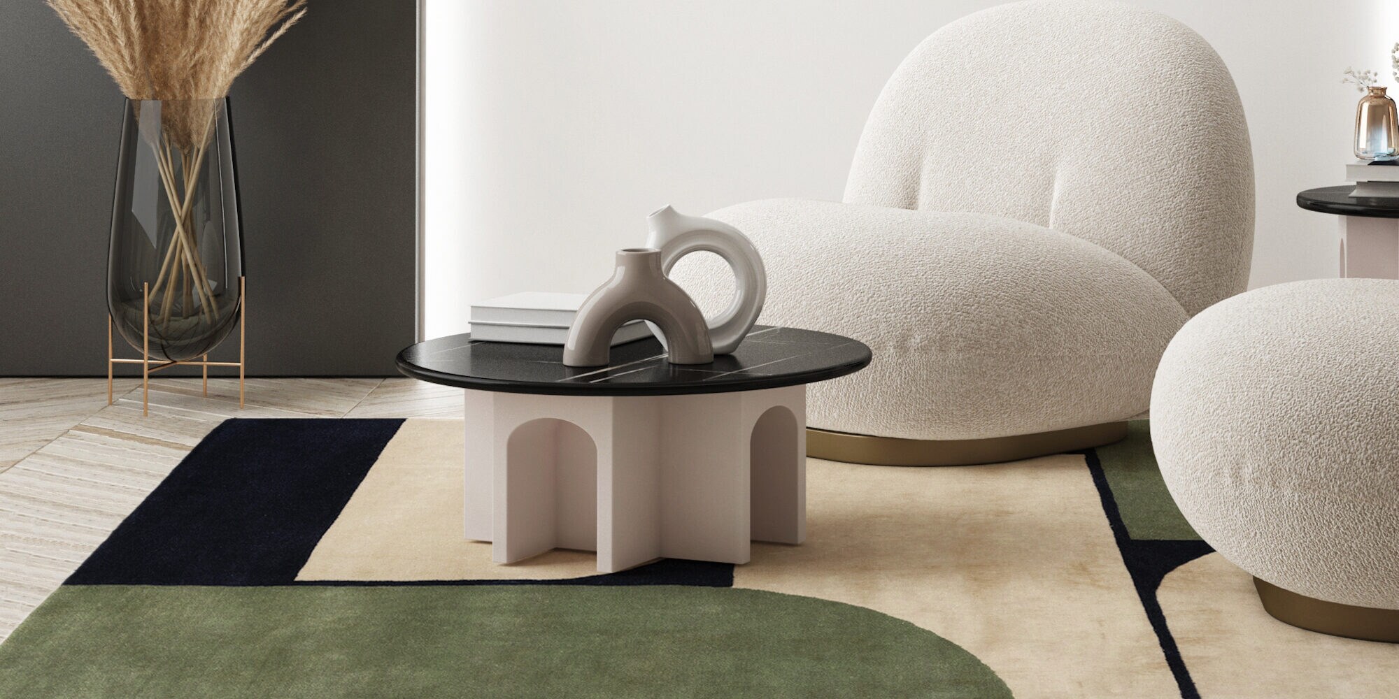 Auf einem Teppich mit geometrischem Muster stehen ein runder Tisch und zwei Sessel Auf einem Teppich mit geometrischem Muster stehen ein runder Tisch und zwei Sessel