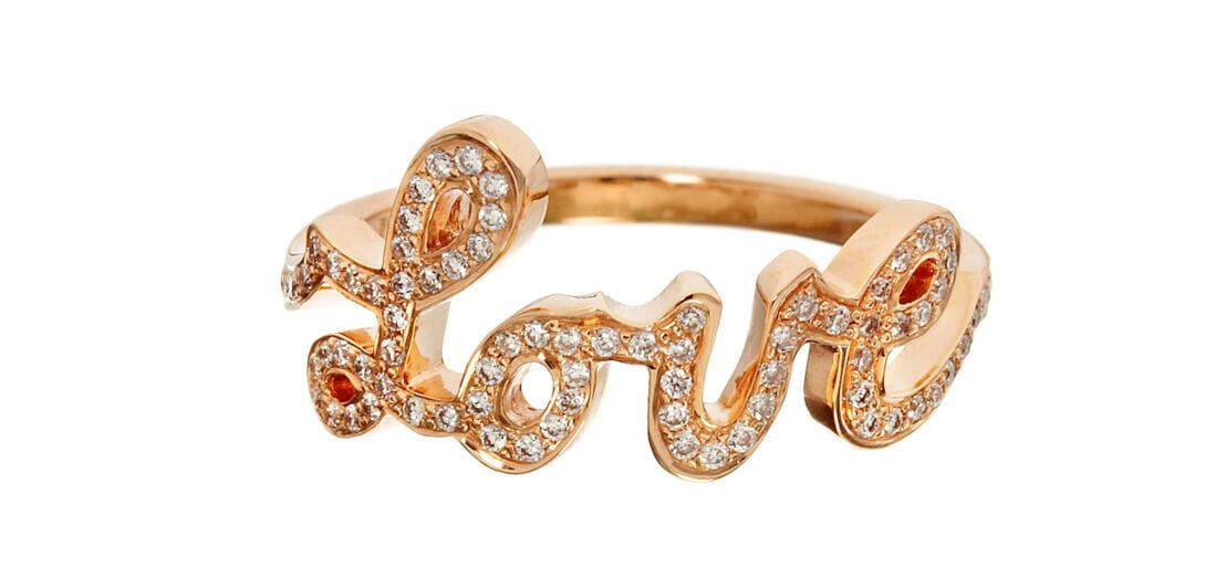 Goldener. mit Brillanten besetzter Ring mit Love-Schriftzug