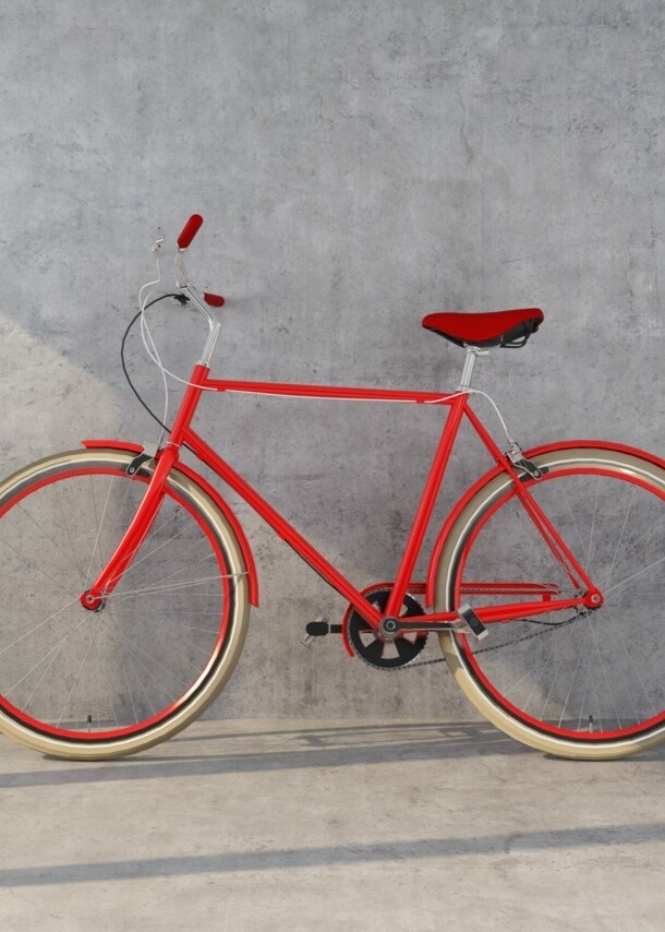 Ein orangefarbenes Designerfahrrad mit Ledersattel vor einer Betonwand
