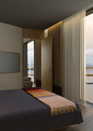 Hotelzimmer mit Bett und einer Aussicht auf Wasser und Berge