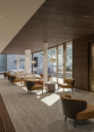 Elegante Hotellobby mit Designermöbeln und Ausblick auf eine Winterlandschaft