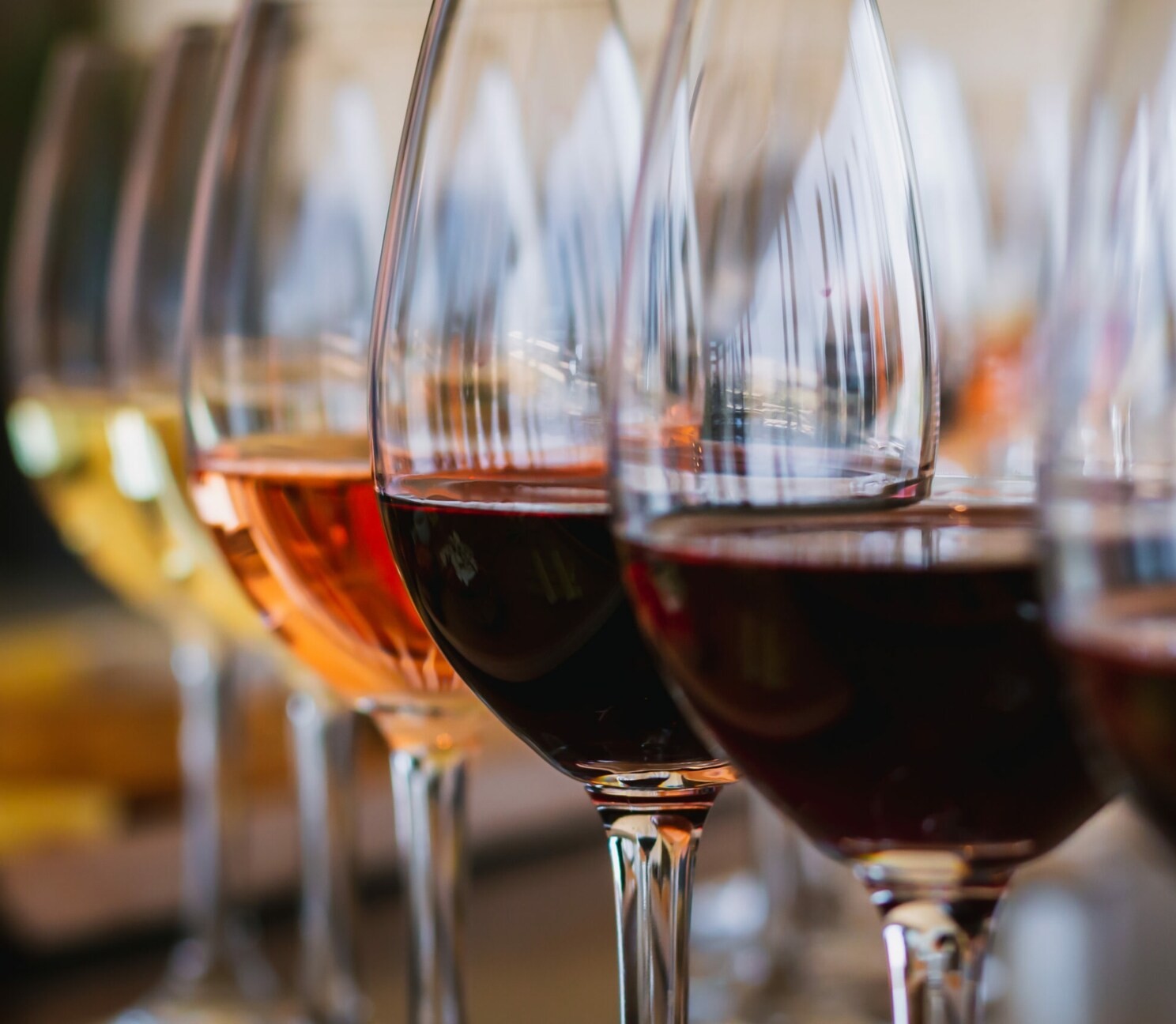 Selective focus on a selection of red, rose and white wines during a wine tasting event on the island of Crete in Greece