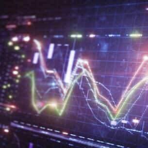 Ein Bildschirm zeigt verschiedene steigende und fallende Kurse.