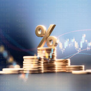 Eine Illustration mit Münzen und einem Prozentzeichen