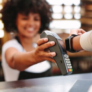 Customer-paying-bill-using-a-smartwatch