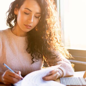 Couple customers holding mobile phone using smartphone apps, close up