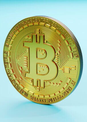 Darstellung eines Bitcoins als haptische Metallmünze