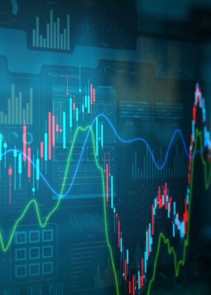 Eine Grafik steigender und fallender Linien symbolisiert Finanzkurse.