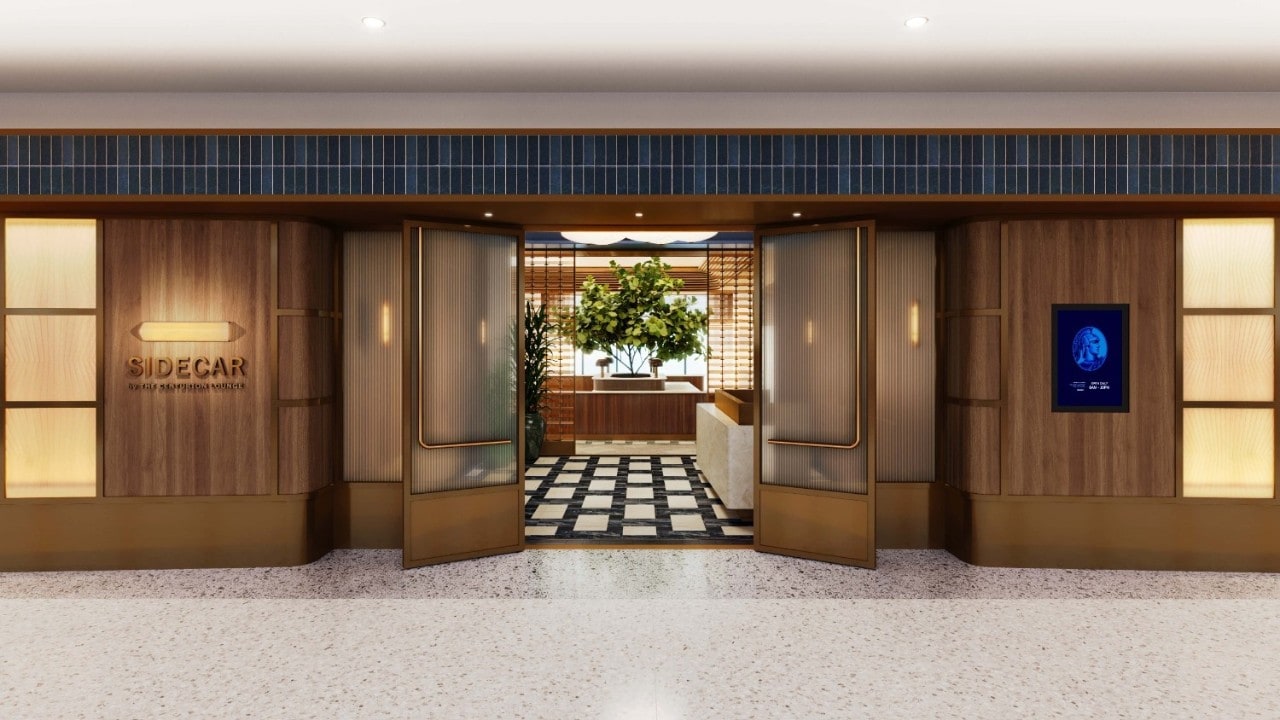 Rendering of the entrance to the new Sidecar by The Centurion Lounge at Charlotte Douglas International Airport, featuring warm wood tones, brass accents, and open double doors leading into an intimate lounge space