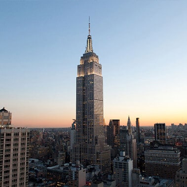 Reach the top of the Empire State Building for breathtaking views. Then head down to STATE Grill and Bar for a craft cocktail.
