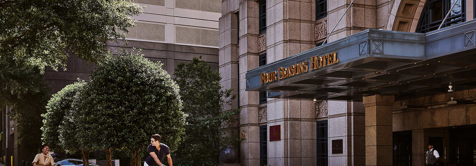 Riding E-bikes in Front of the Hotel