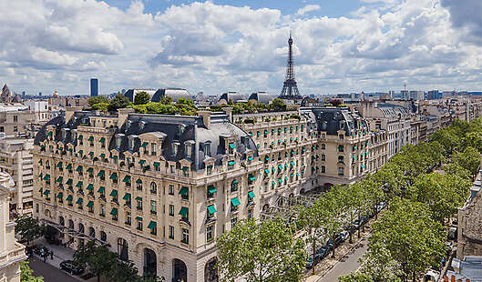 Exterior image of the hotel with Paris sites in the background