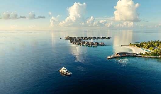 Where the endless ocean meets the infinite sky at the horizon at The St. Regis Maldives Vommuli Resort