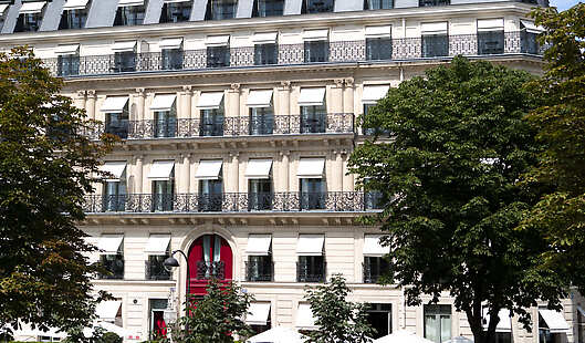 La Réserve Paris front building and trees