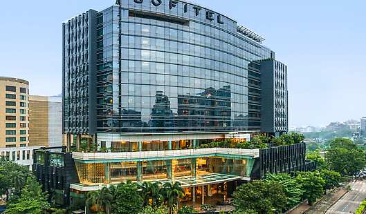 A crisp daytime view of the hotel façade, blending French-inspired elegance with the bold urban character of Bandra Kurla Complex.