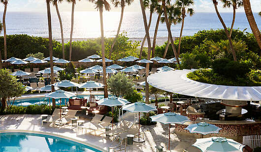 Soleo Pool Bar, Pools and beach at sunrise