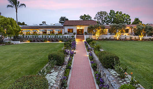 Hidden in the hills of North San Diego, The Inn at Rancho Santa Fe is surrounded by lush landscapes and historic charm.