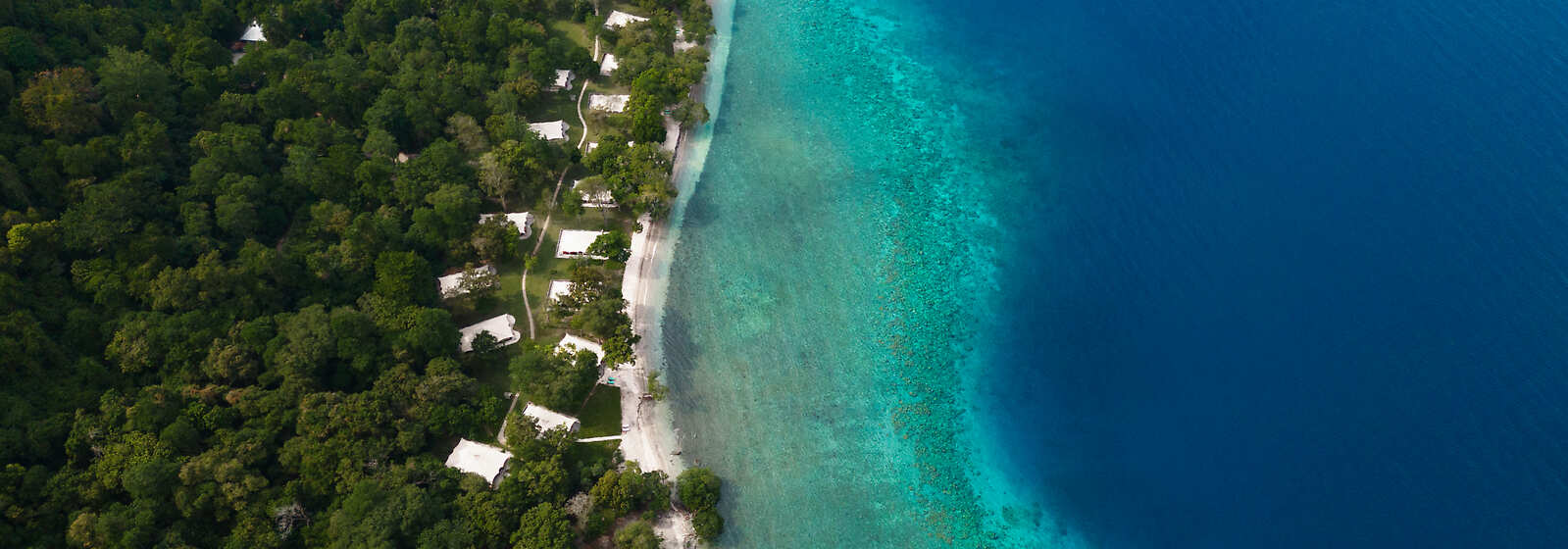 Aerial View of Amanwana Resort and Bay