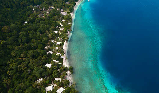 Aerial View of Amanwana Resort and Bay