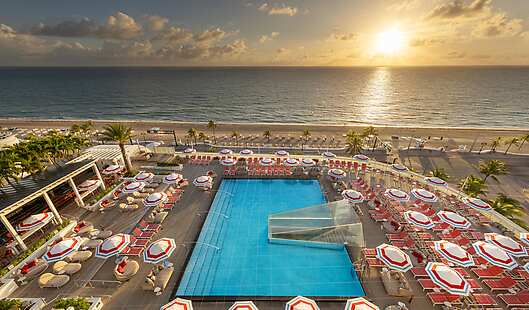 Aerial View of Swimming Pool and Umbrellas