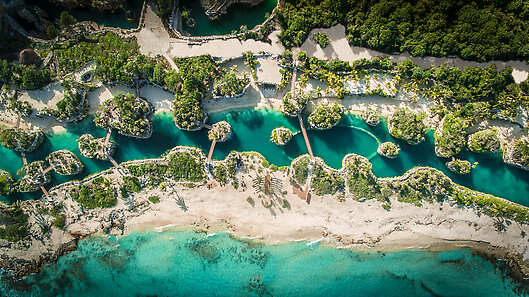 Beach area at Hotel Xcaret Mexico, a Preferred Partner of Classic Vacations.