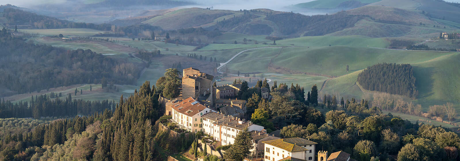 An aerial shot of Castelfalfi village and the surrounding owned estate.