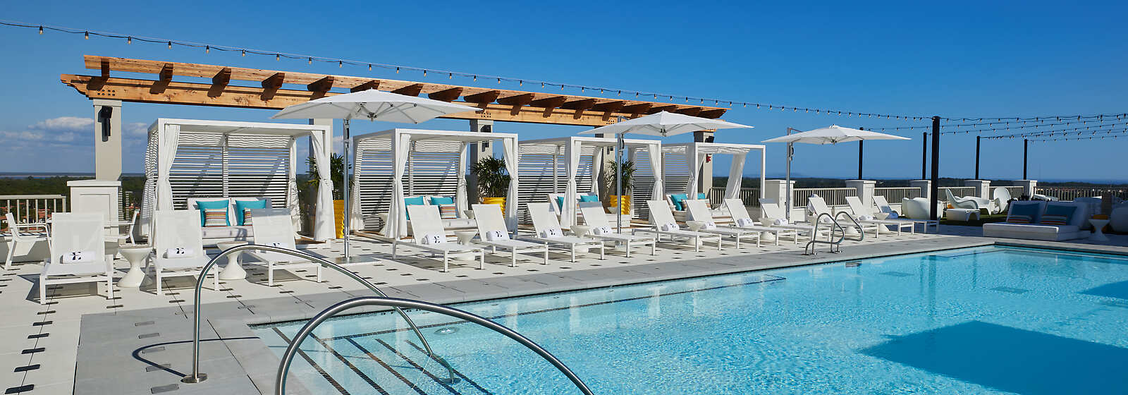 Heated spa pool, private luxury cabanas and a panoramic view of Sandestin Golf and Beach Resort.