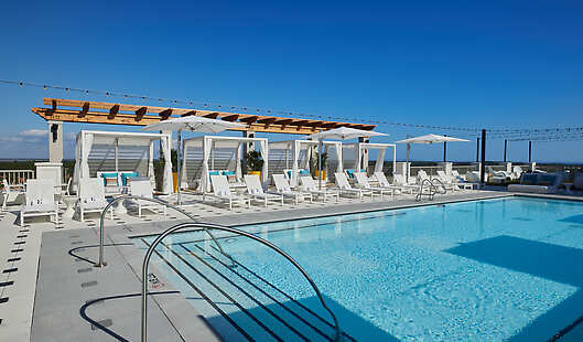 Heated spa pool, private luxury cabanas and a panoramic view of Sandestin Golf and Beach Resort.