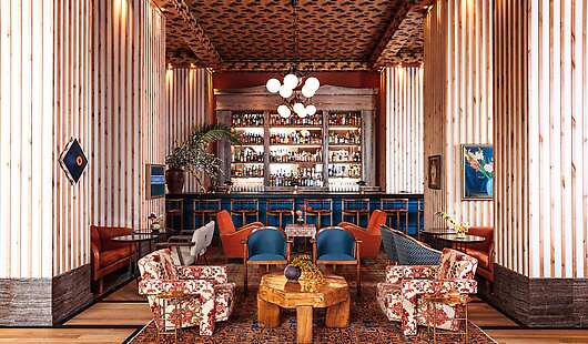 The Peacock Bar in the lobby, the sprawling bar provides a full dining experience and offers a condensed food menu.